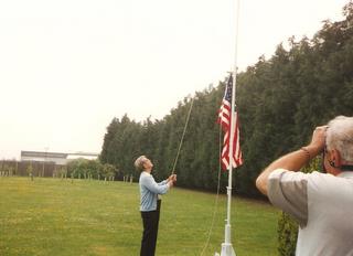 1997 - Dave Glick raises the flag at the 489th Memorial